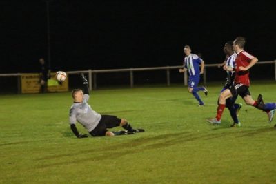 Knaresborough striker Brad Walker slots the ball past Nostell goalkeeper Richard Watson. Picture: Craig Dinsdale