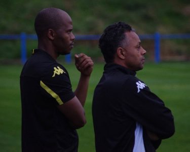 Lebogang Ramatlotlo and Phil Harding (right) on the touchline at Yorkshire Amateur