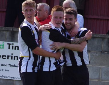 Kai Hancock (centre) scored the winner for Athersley at Worksop