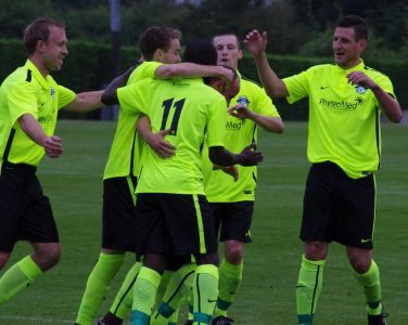 New Hemsworth captain Luke Danville congratulates Del Pollock on his goal