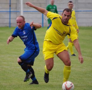 Former Leeds United midfielder Simon Walton made his league debut for Garforth