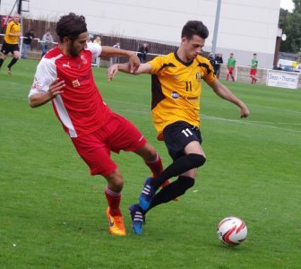 Tom Dugdale holds Stocksbridge right-back Josh Meade