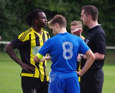 Referee Jamie Waters talks to the captains Franck Zalo and James Reed after a couple of tasty challenges