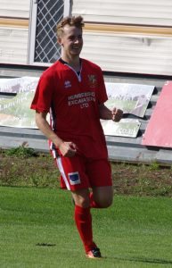 Joel Sutton celebrates scoring