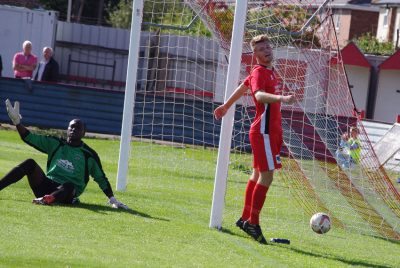 Bojang and Lewis look up, expecting an offside flag