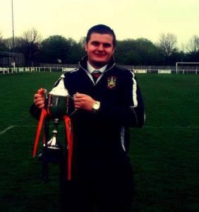 Brighouse Town gateman Will Armitage with the NCEL Premier Division title in 2014