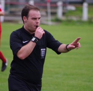 Referee Robert Woodburn