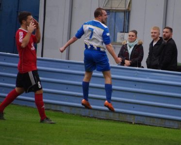 Luke Harrop celebrates after scoring the winner for Eccleshill