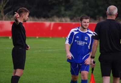 Dismissed Hall Road midfielder Brad Ricketts gave the referee little option