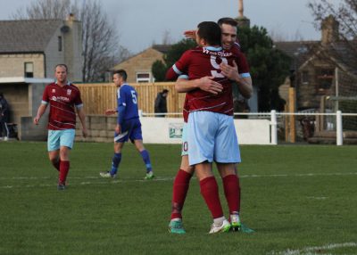 Kieran Ryan and Ash Flynn celebrate during AFC Emley's win over Winterton. Picture: Mark Parsons