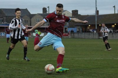 AFC Emley captain Kieran Ryan shoots for goal during the 5-0 win over Westella. Picture: Mark Parsons 